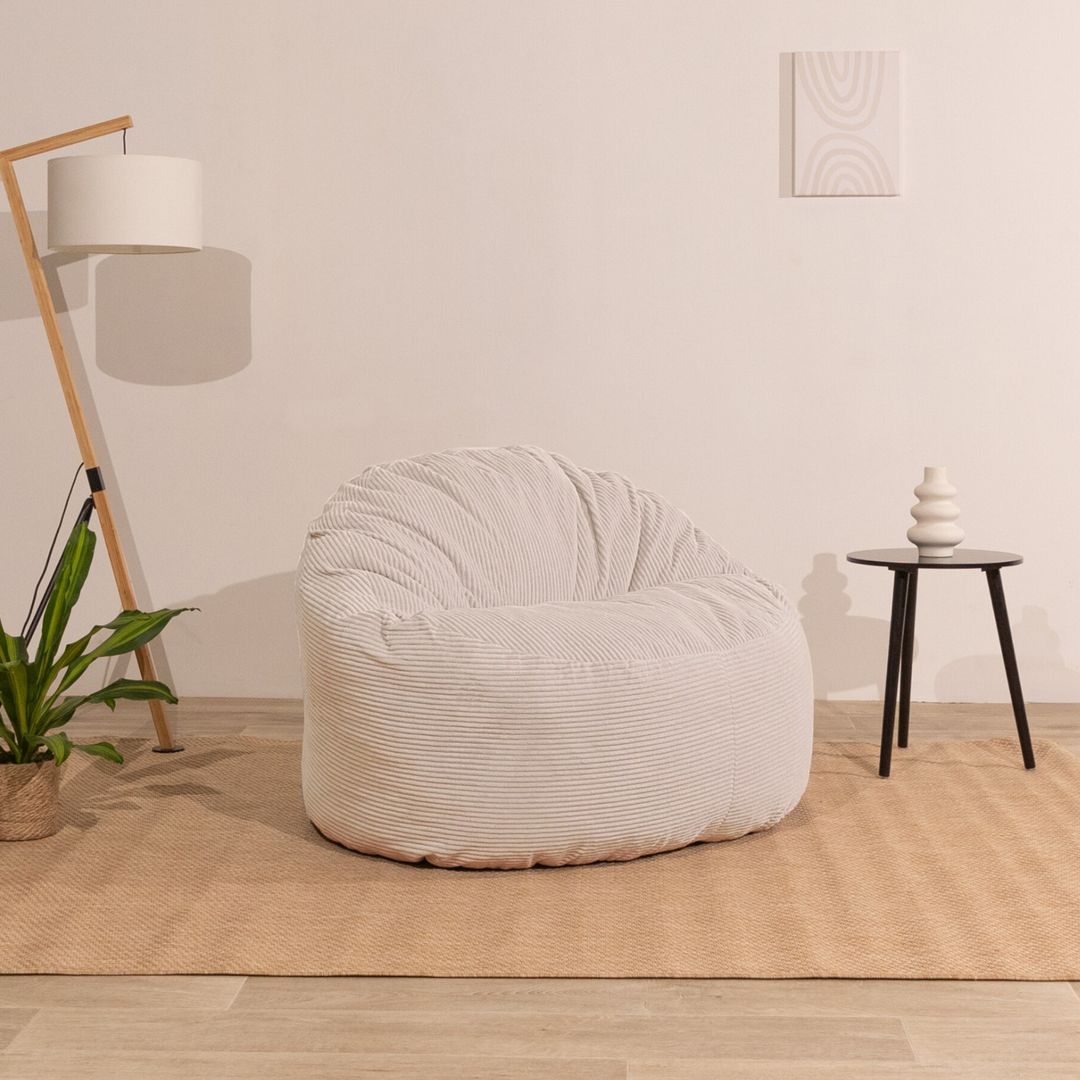 Pouf en velours côtelé épais blanc cassé